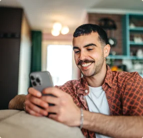Employee using their phone for physician-led care